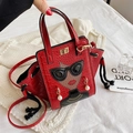 Red crocodile pattern wing tote bag with 3D sunglass girl print and pearl earrings - Red