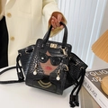 Elegant black crocodile-textured tote bag with stylish portrait and 3D jewelry details - Black