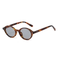 Vintage-Sonnenbrille mit ovalem Schildpatt-Rahmen, grauen Gläsern und Nieten - Schildpatt Rahmen Graue Gläser