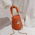 Orange crocodile pattern bucket bag with gold chain strap and elegant ruched handle - Orange