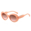 Gafas de sol vintage rosa coral con montura ovalada y detalles de remaches dorados - Montura Rosa Lentes Marrón Rosa