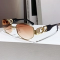 Chic polygon sunglasses with golden frame and brown gradient lenses on white pedestal - Gradient Tea