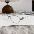 Silver polygonal metal frame sunglasses featuring pink rhinestone floral temple accents - Bright Nickel Anti Blue Light