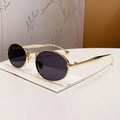 Chic vintage oval sunglasses with polished gold metal frames and dark lenses - Bright Gold Gray