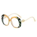 Fashionable scalloped edge oval sunglasses with green tortoiseshell frames and gold hearts - Hawksbill Orange Frame (Clear Lens)