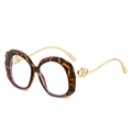 Oval scalloped tortoiseshell sunglasses with gold metal heart temples and leopard print - Hawksbill Frame (Clear Lens)
