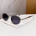 Fashionable oval sunglasses featuring a sleek silver metal frame and dark grey lenses - Bright Nickel Grey
