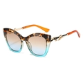 Lunettes de soleil œil de chat, monture dégradée bleu écaille et branches notes de musique - Monture Léopard Thé Verres Thé Bleu
