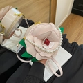 Pink camellia flower shaped crossbody bag with pearl handle and golden hardware - Pink