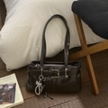 Deep coffee brown vintage hobo bag with silver buckle and pearl bow charm accessory - Brown