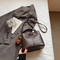 Chocolate brown bucket bag with plush bear charm and adjustable shoulder strap - With Pendant / Brown
