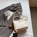 Cream white bucket bag with a cute brown bear plush charm and adjustable shoulder strap - With Pendant / Off-white