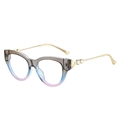 Lunettes de soleil œil de chat avec branches dorées et dégradé tricolore gris et rose - Monture Gris Bleu Verres Transparents