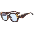 Occhiali da sole geometrici oversize con montura leopardata e lenti azzurre moderne - Montatura Leopardata Lente Blu