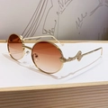 Round gold metal sunglasses with brown gradient lenses and snake-shaped temples - Gradient Tea