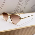 Occhiali da sole cat-eye dorati con testa di leopardo e lenti rosa sfumate - Tè rosa sfumato