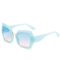Translucent blue oversized sunglasses with blue-orange gradient lenses and gold metal accents - Transparent Blue Frame Blue Yellow Gradient Lens