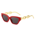 Fashionable red cat eye sunglasses with gold chain temples and grey polarized lenses - Red Frame Grey Lens