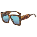 Retro square oversized tortoiseshell sunglasses with vibrant blue lenses shown at an angle - Tortoise Frame Blue Lens