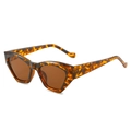 Lunettes de soleil œil-de-chat géométriques en écaille avec des verres marron chic - Monture Léopard / Verres Thé
