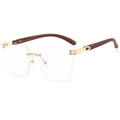 Frameless square sunglasses with gold metal bridge and dark wood grain temples - Brown Pattern Temples Clear Lens