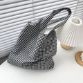 Detail of black and white gingham canvas tote bag texture on a minimalist desk - Black Gingham Double-layer Vest Style