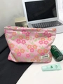 Rosafarbene Kosmetiktasche mit Jacquard-Blumenmuster und elegantem ATRYG-Stoffetikett - Jacquard Rosa