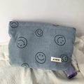 Detailed close-up of light blue corduroy pouch with black smiley face prints and a logo label - Fog Blue Smiley Face Storage Bag