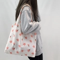 White canvas tote bag with pink floral cherry blossom patterns and wide shoulder straps - Sakura Pink Floral (With Lining)