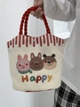 Detail view of canvas tote bag showing red rope handles and happy animal prints - Red Braided Handle Animal Trio Style (Happy)