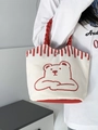 Detail of small canvas tote bag with red handles and cute cartoon bear print decoration - Red Braided Handle Line Art Bear Style