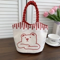 Detail of canvas bucket bag with cute bear print and red woven rope handles - Calm Bear