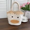 Detail of canvas bucket bag with braided rope handles and cute cartoon duck print - Speechless Duck