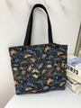 Large black jacquard tote bag featuring colorful butterfly patterns and woven handles - Black Butterfly Style