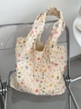 Detail of floral embroidery canvas tote bag hanging on a modern minimalist chair - Full Floral Embroidery (Beige) / 0.0