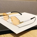Rimless hexagon sunglasses with amber gradient lenses and gold metal bridge - Transparent Orange (A310)