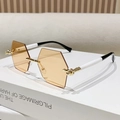 Frameless hexagonal sunglasses with amber lenses and black and white mixed arms - Transparent Orange (A310)