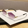 Rimless geometric sunglasses with purple gradient lenses and gold metal accents - Gradient Grey