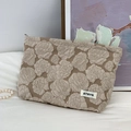 Detail of vintage jacquard makeup bag with rose relief texture on white linen - 3D Floral Khaki Makeup Bag