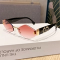 Frameless diamond-cut sunglasses with pink gradient lenses and gold logo detail - Gradient Burgundy