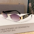 Frameless diamond cut sunglasses with purple gradient lenses and gold logo detail - Gradient Grey