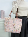 Pink canvas bucket bag featuring colorful floral embroidery and striped handles - Multi-color Rope Floral / Pink