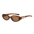 Lunettes de soleil ovales en écaille avec détail nœud argenté sur la monture - Monture Léopard / Verres Thé