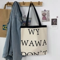 Bolso tote minimalista de lona blanco roto con correas negras y diseño de letras - Beige Estampado de Letras