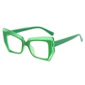 Occhiali trendy a gatto geometrici verdi con lenti trasparenti, vista laterale a 45 gradi - Montatura Verde