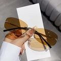 Lunettes de soleil polygonales sans monture avec verres dégradés ambre et pont doré - Monture Dorée Verres Café