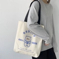 Minimalist off-white canvas tote bag with cartoon bear print and black handles - Cute Bear Beige Shoulder Style