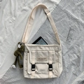Minimalist off-white nylon messenger bag with frog pendant and CALL&LADY logo - With Frog Pendant / Off White