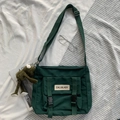 Dark green nylon messenger bag with buckle closure and plush frog pendant - With Frog Pendant / Dark Green