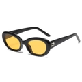 Retro oval sunglasses in black frame with vibrant yellow lenses and silver metal hinges - Black Frame Yellow Lens